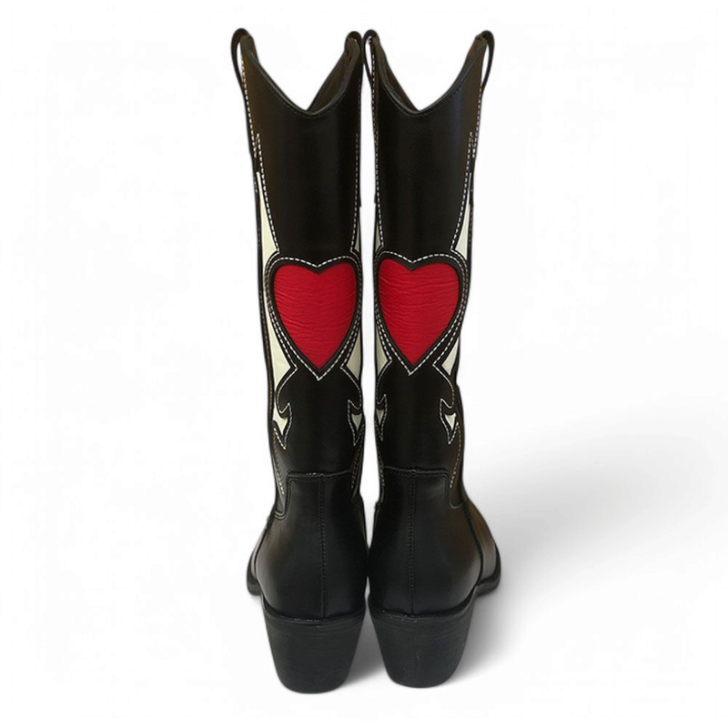 Back view of twin black boots with large red hearts.