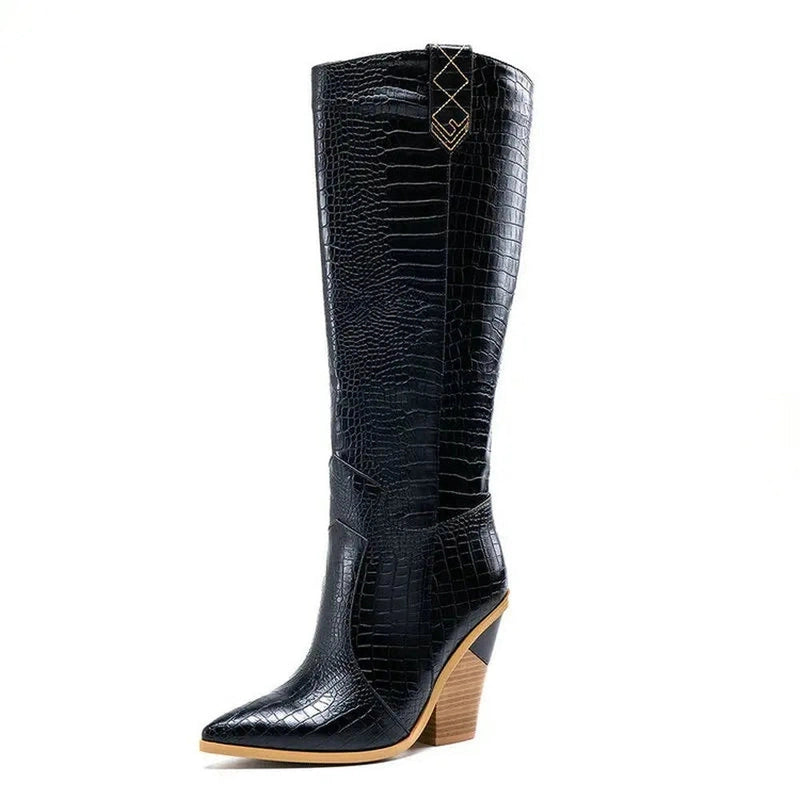 Side view of a black knee-high boot with crocodile texture.