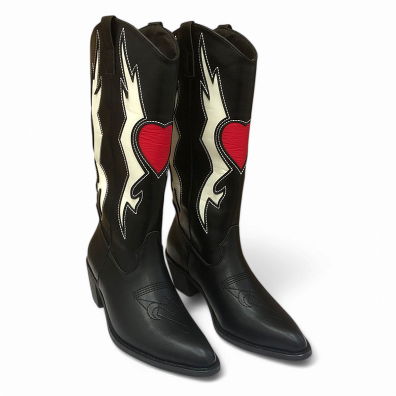 Pair of black boots with red hearts and white lightning on white background.