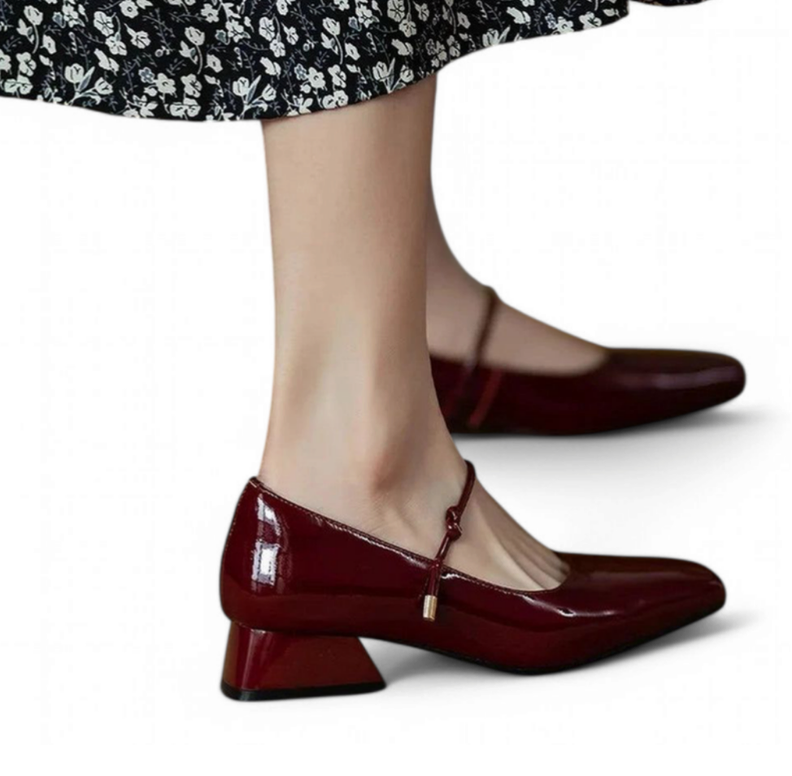 Burgundy pair highlighting the angled mid-height heel and patent finish.