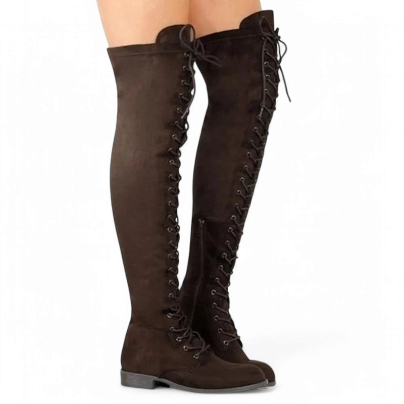 Dark brown lace-up over-the-knee boots worn on both legs