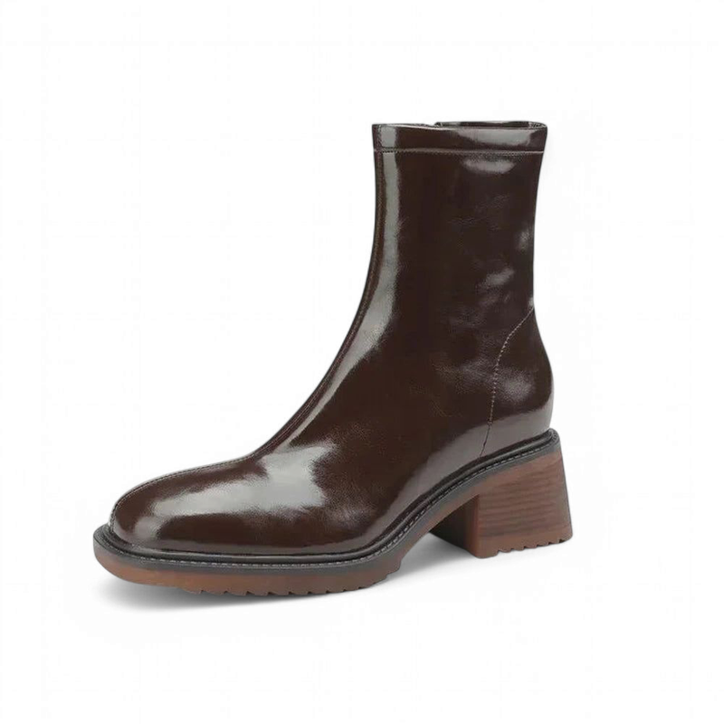 Side profile of a sleek brown mid-calf boot with square toe and low stacked heel