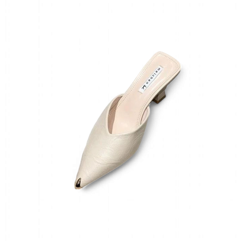 Ivory PU slide with metal‑tipped pointed toe on white background, angled top view