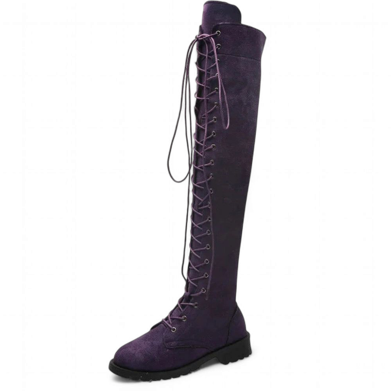 Purple suede boot with front laces and rubber sole in a tall silhouette