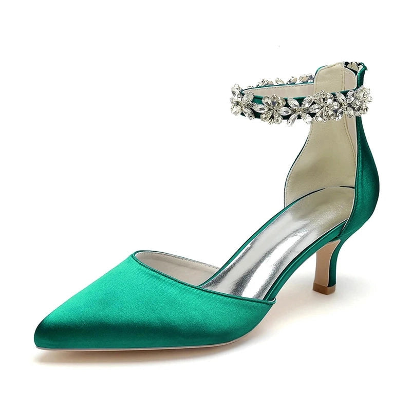 Alternate angle of teal pump highlighting fabric sheen and crystal sparkle.