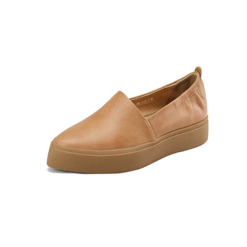 Single camel slip‑on loafer with rubber cupsole, isolated