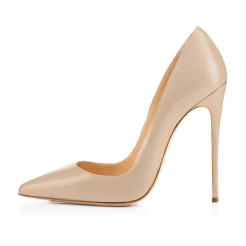 Nude pump in profile showing sleek pointed toe and thin heel