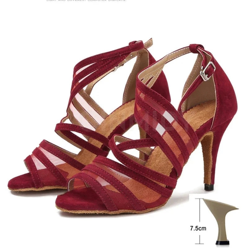Red open-toe Latin dance sandals with mesh and suede straps, ankle buckle; pair at three-quarter view, heel height marker 7.5 cm.