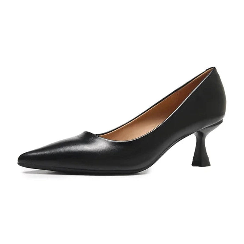 Three-quarter view highlighting pointed toe and curve