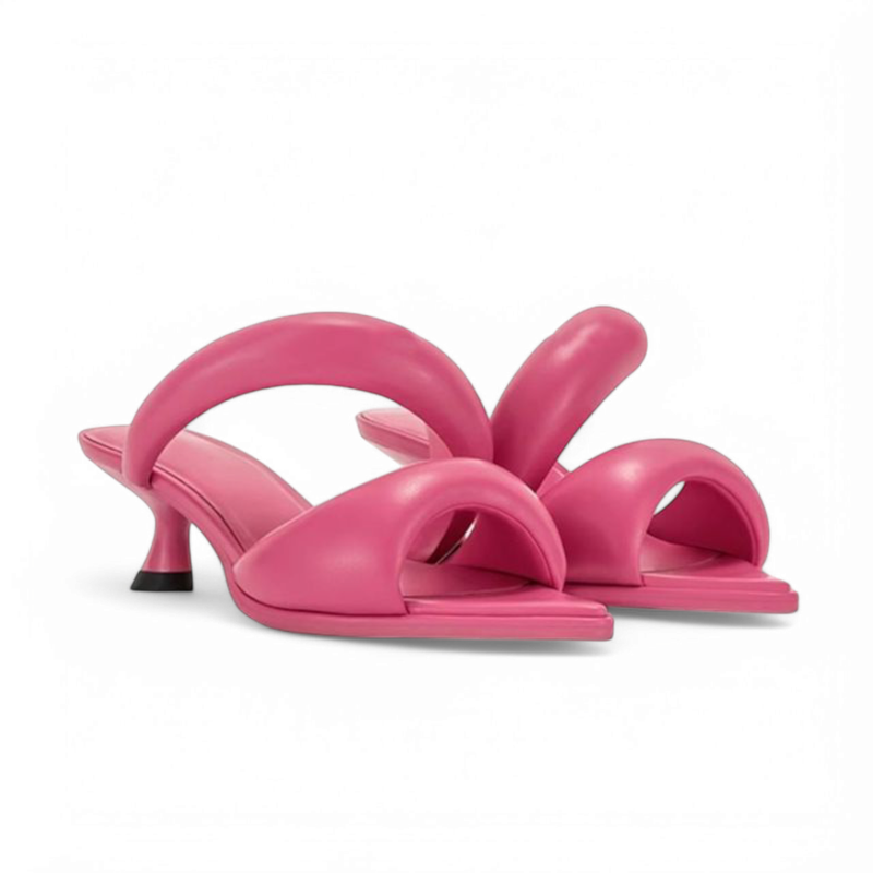 Front view of pink sandals accentuating the double curved front strap.