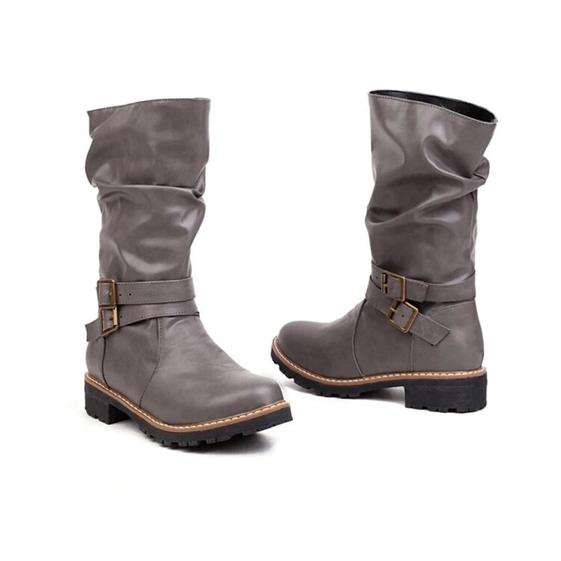 A front-angled shot of both Merendy Sassa boots in gray, showing the soft slouchy shaft and elegant side buckles.