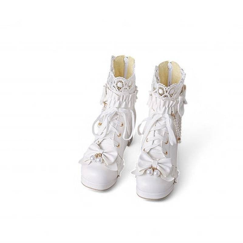Both boots displayed together, capturing the full romantic aesthetic from every angle.