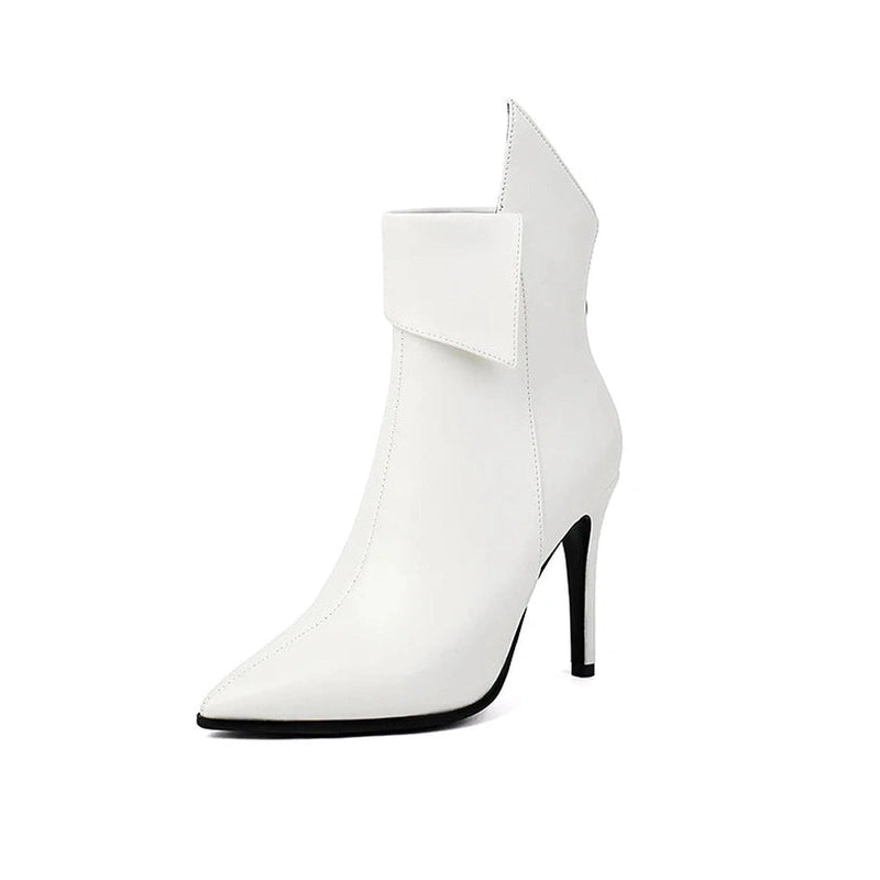 Studio shot of white boot standing upright, slim proportions and clean lines.