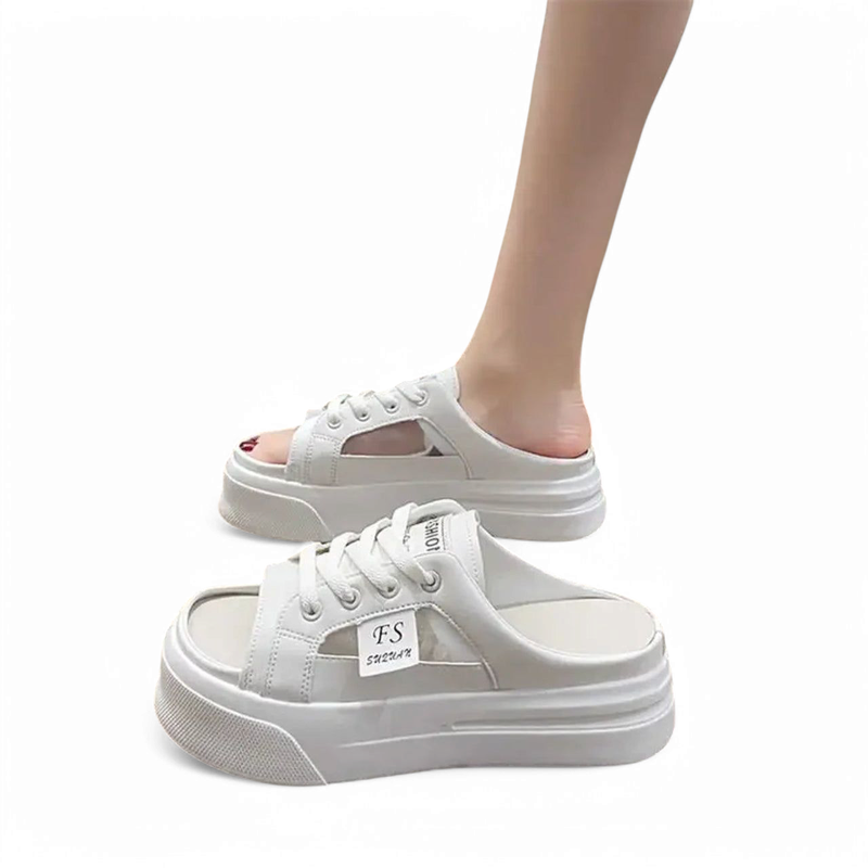 White lace-up platform open-toe sandal shown on a model’s foot, side view, white background