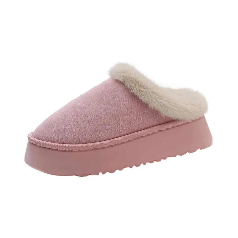 A warm dusty pink slip-on slipper with a subtle faux fur trim along the collar, seen from the side.