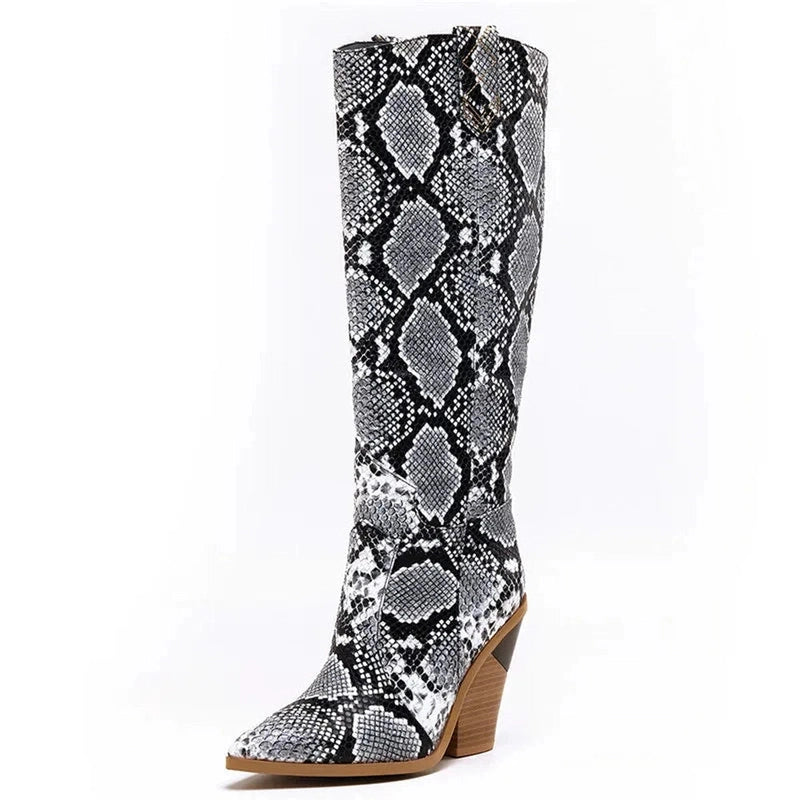Side view of a knee-high boot featuring a black and white snake pattern.