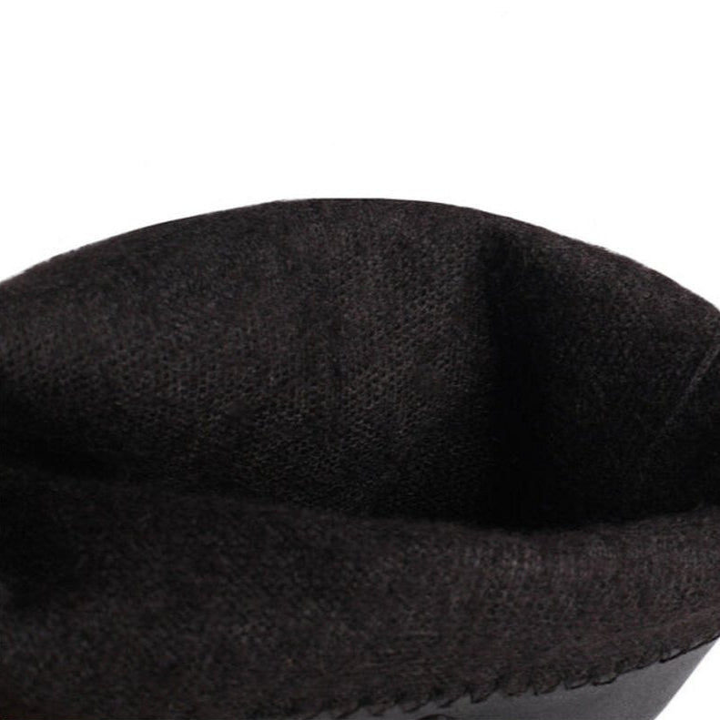 View of soft black wool-like lining inside boot shaft.