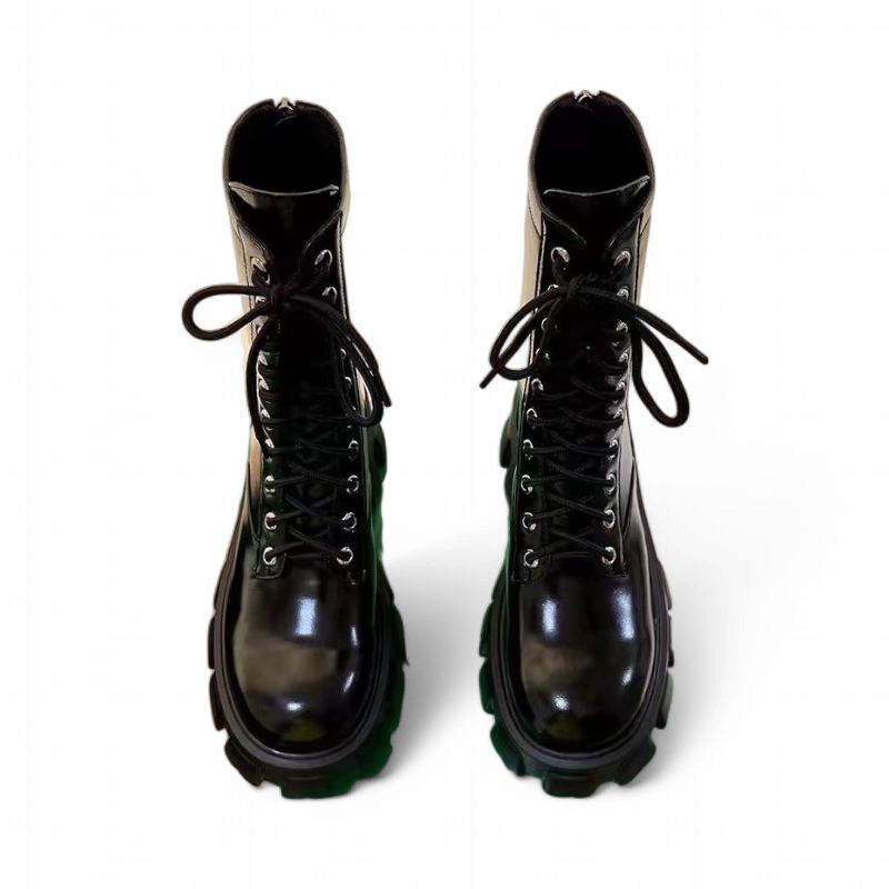 Direct front view of both boots showing laces and symmetry.
