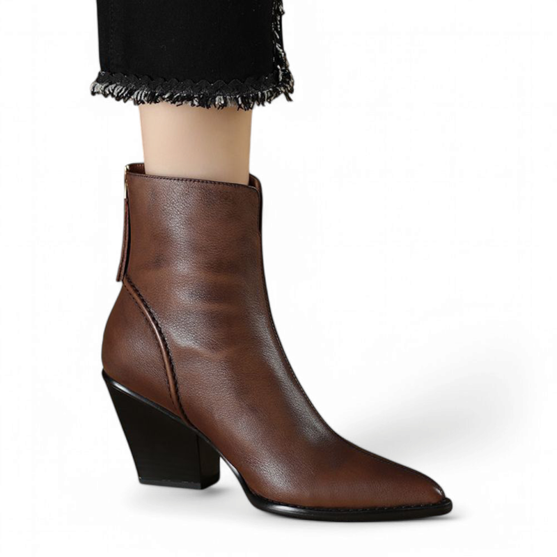 Single brown boot shown at an angled side view, highlighting the curved heel and clean seam lines.