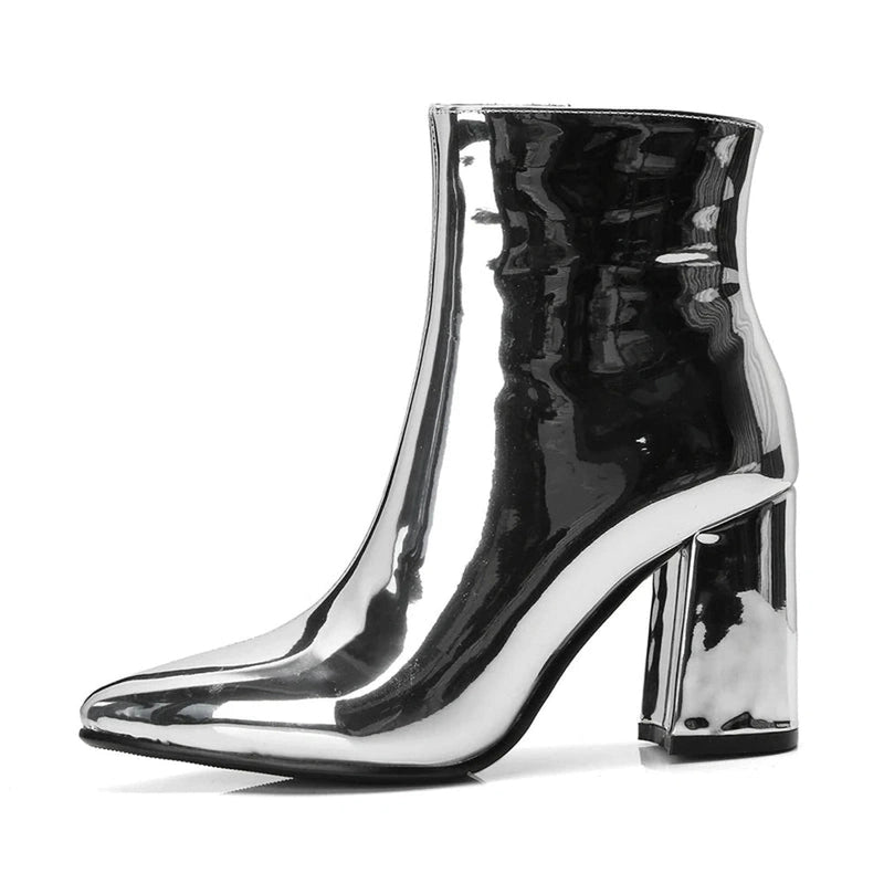 Side profile of silver mirror boot, smooth reflective surface
