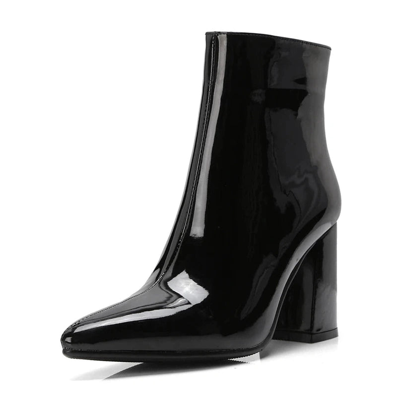 Front-angled view of black patent boot, high shine finish.