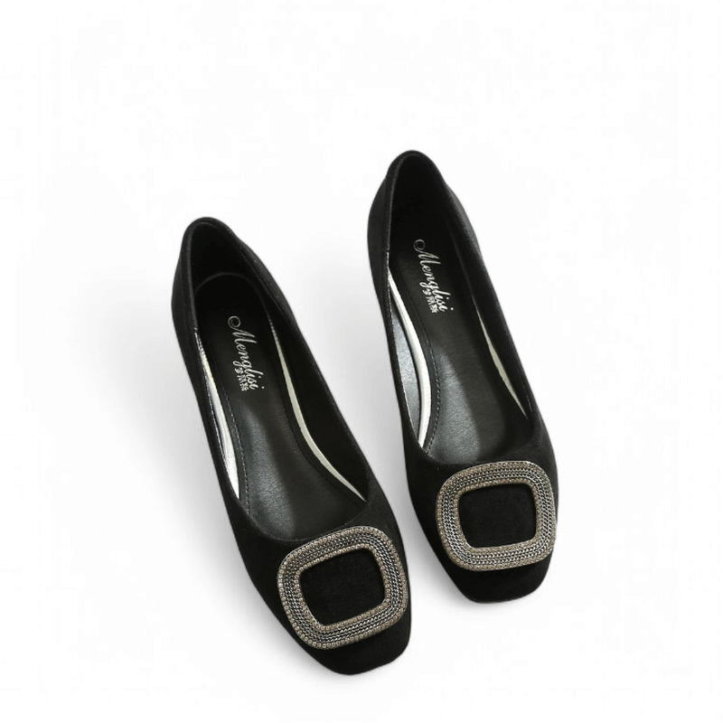 Wide-fit black ballet flat with sparkling square buckle, angled view showing toe box and vamp.