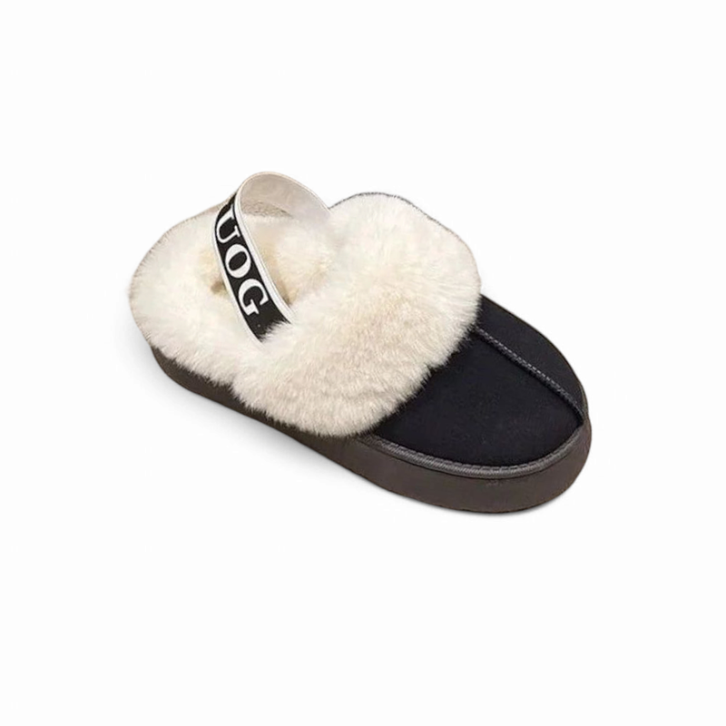 A black slipper seen from above, showing the rounded toe, faux suede surface, and soft fur lining around the opening.