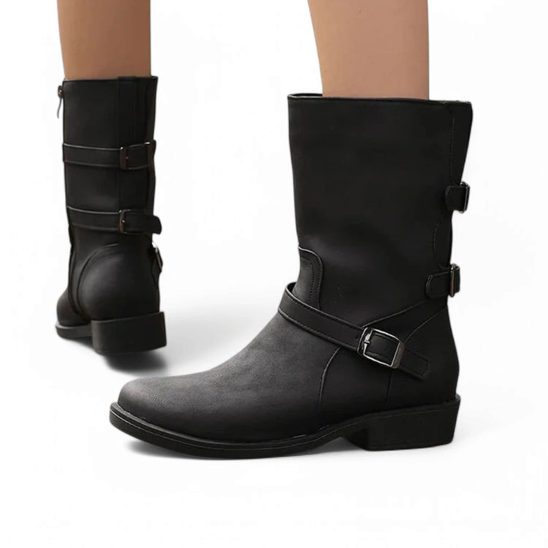 Woman styled in Merendy Salsa boots, viewed from the side and back —showing the relaxed fit and urban elegance.