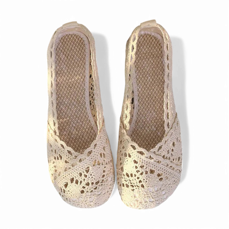 Top-down view of beige Merendy Sika flats showing lace details, round toes, and woven insoles.