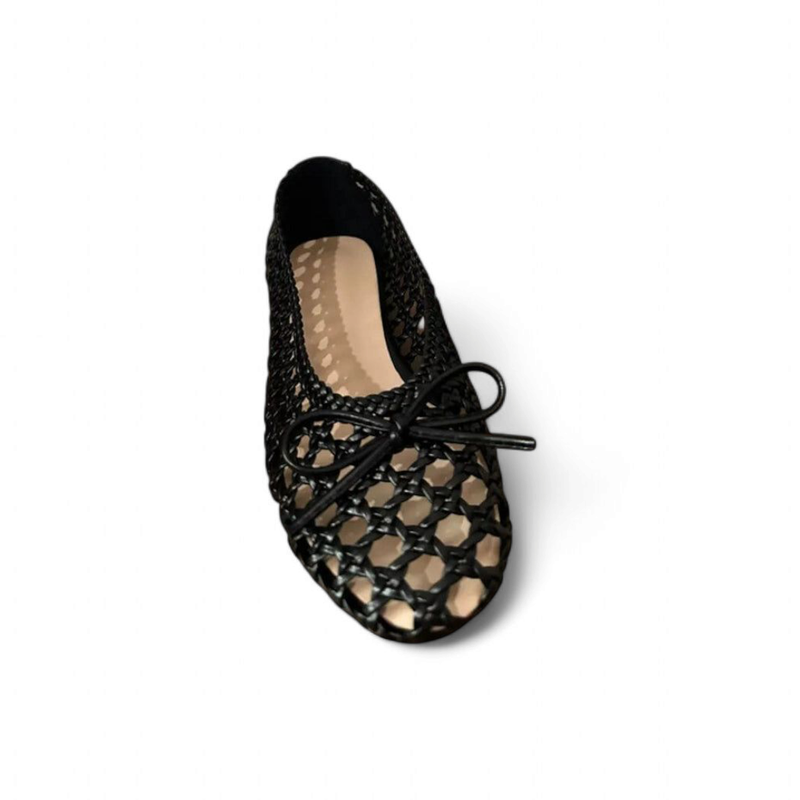 Single shoe at front angle highlighting mesh cut-outs and neat bow.
