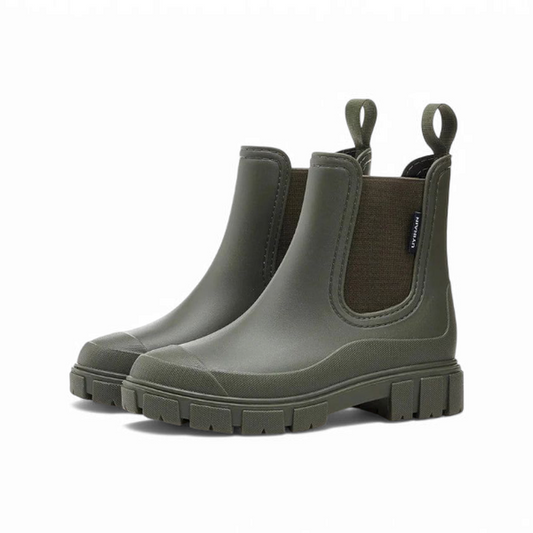 Green chunky Chelsea boots placed side by side at a front angle.

