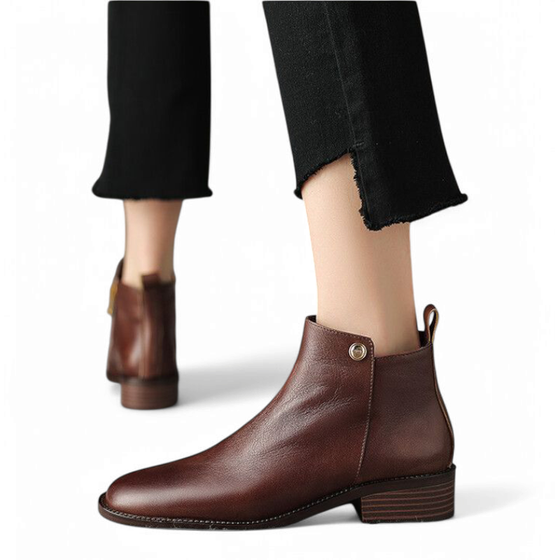 Brown boots on woman’s feet shown from both front and back angles