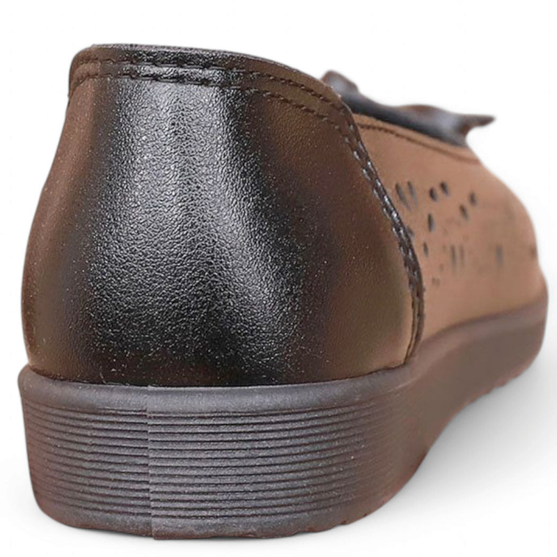 Close-up of black  heel showing leather texture and seam.
