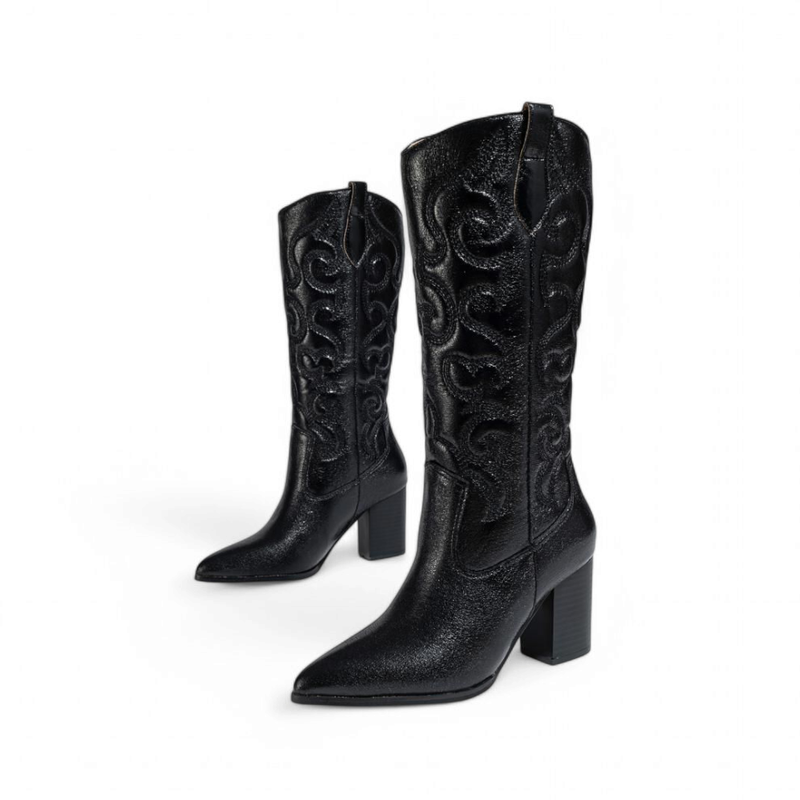 Pair of lightly glossy black western boots with high chunky heels and pointed toes, front view.
