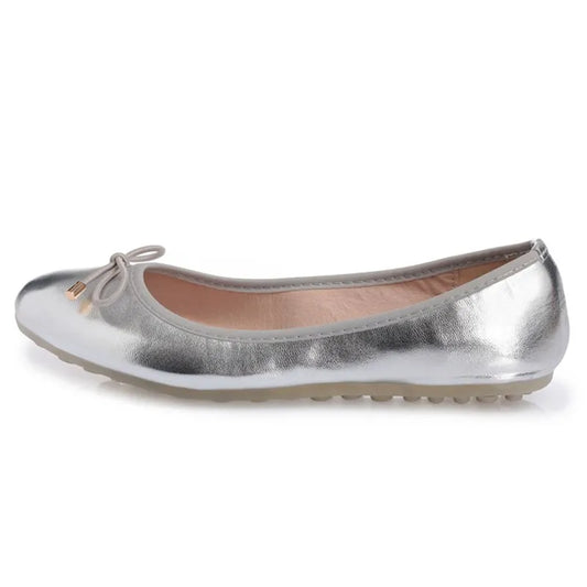 Bright-silver ballet flat with round toe and low profile sole, full side view.