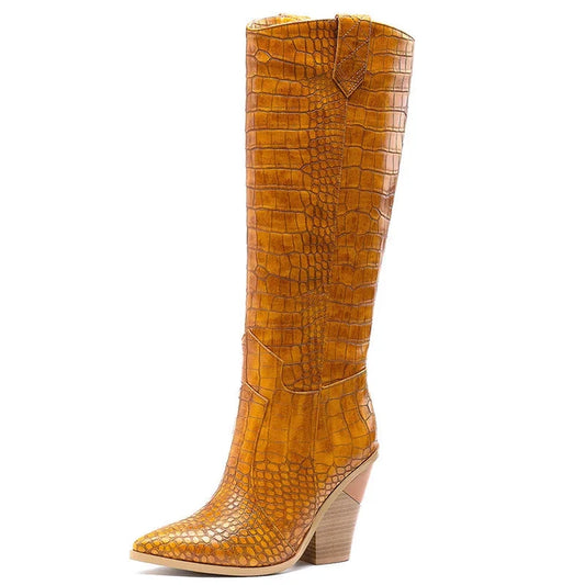 Side view of a knee-high brown leather boot with crocodile texture.