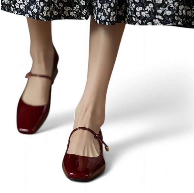 Burgundy pair front view showing square toe line and slim single strap across instep.