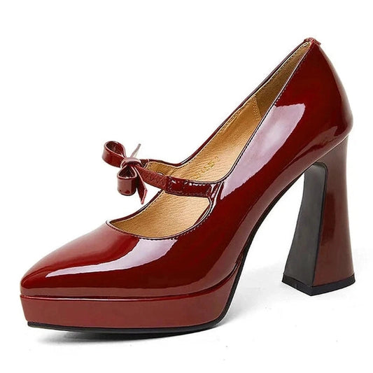 Single glossy burgundy Mary-Jane with front platform, angled front view.