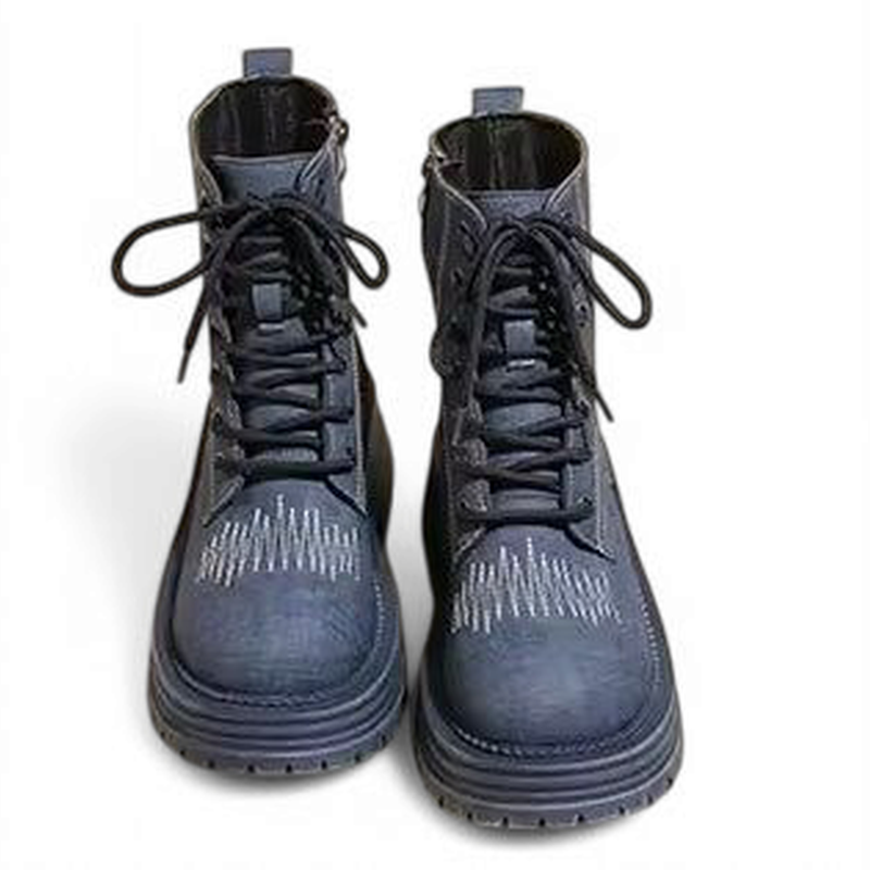 blue denim boots front-facing, laces tied; embroidery on toes.