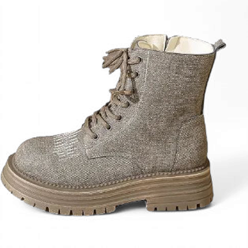 Left taupe boot in profile displaying ergonomic panels and pull tab.