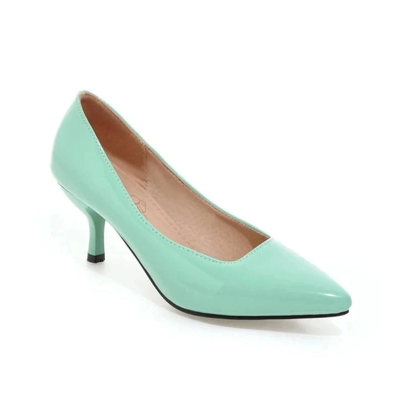Glossy mint-green kitten-heel pump, side view on white background.