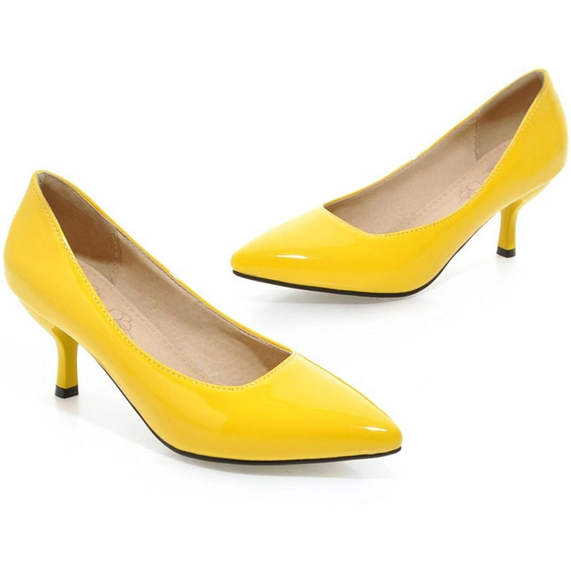 Side pair view of glossy yellow pointed-toe kitten heels.