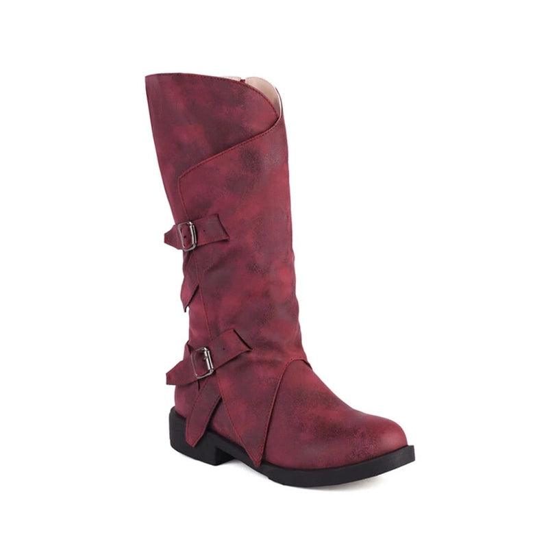 Knee-high red boot shown from the front, highlighting its sleek silhouette and wide opening