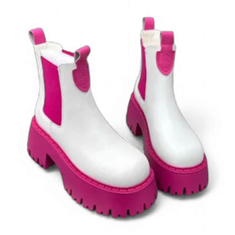 Front angle view of a white Chelsea boot with pink chunky sole and pink elastic side panels.
