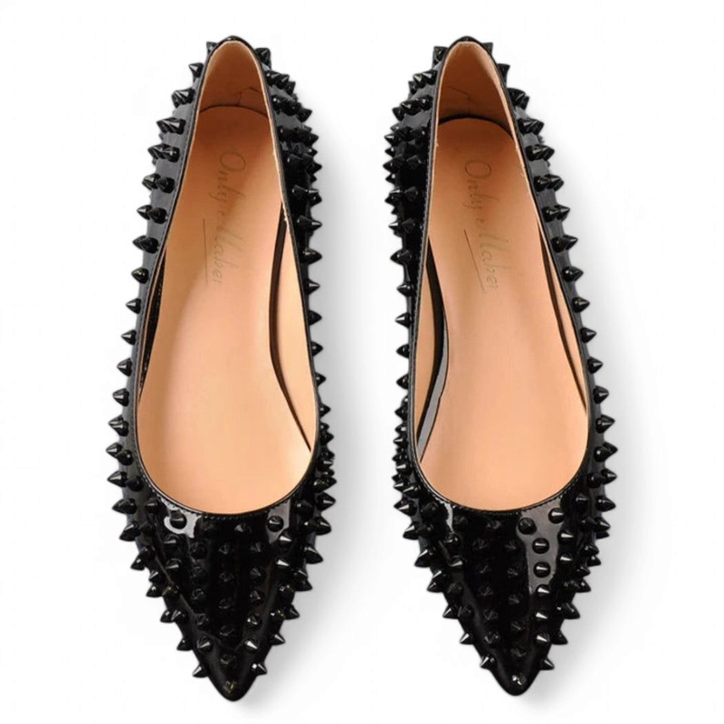 Top shot of black pair highlighting pointed toes and dark studs.