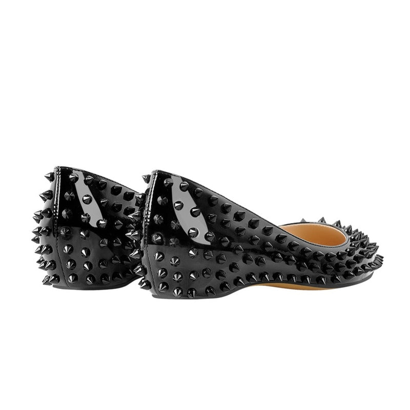 Rear angled pair showing black heels and matching spikes.