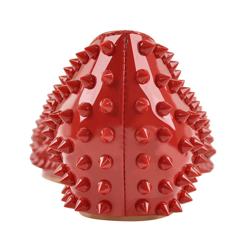 Rear view showing a red heel covered in bold spikes.