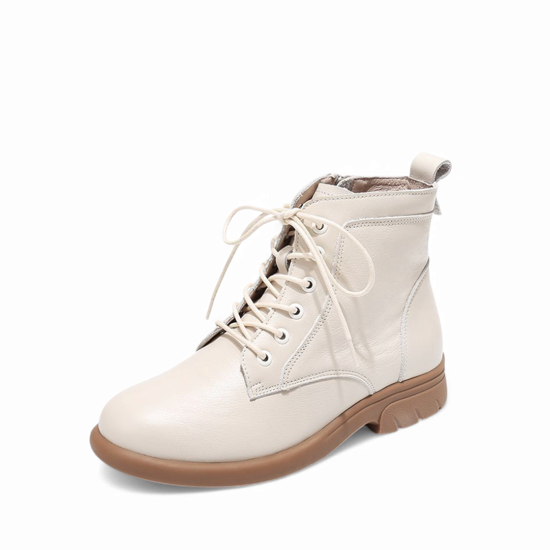 Cream-colored leather ankle boot with lace-up front and chunky heel, side view.
