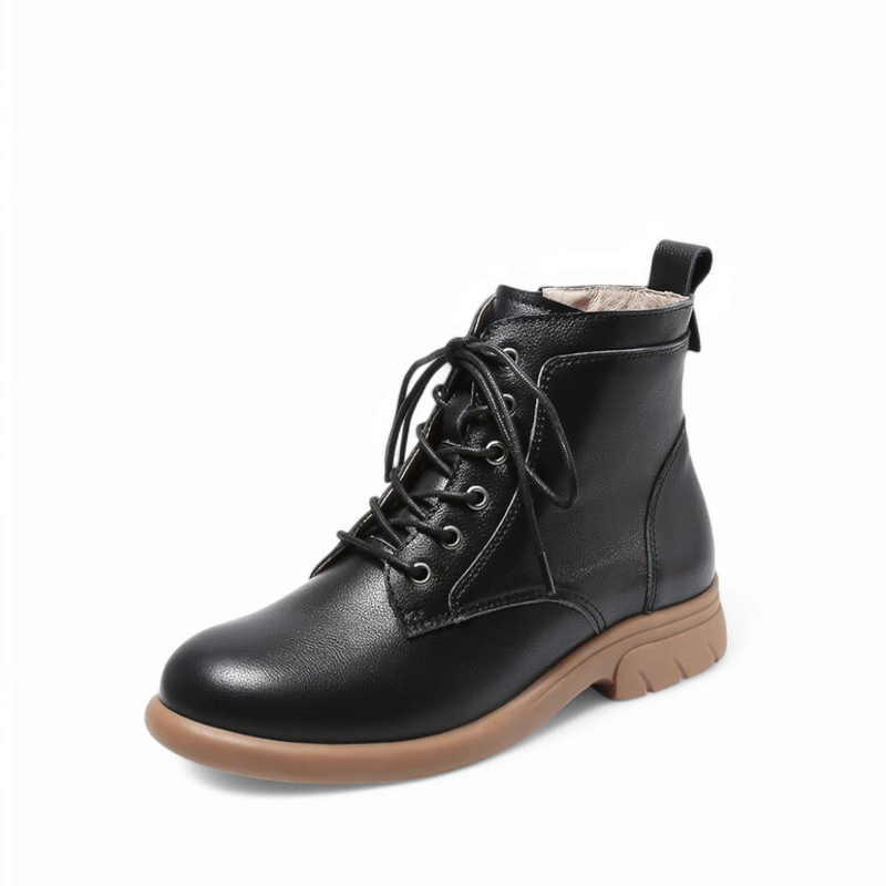Left side view of a black leather boot showing sole and stitching.

