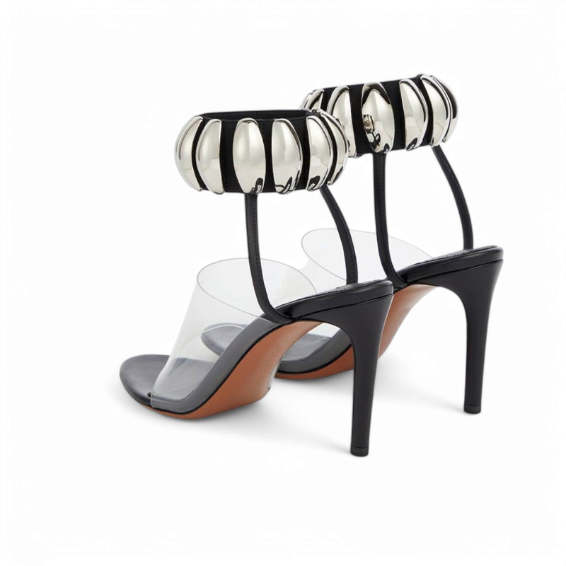 Rear angle of the sandal pair showing thin heels and metallic ankle ring.